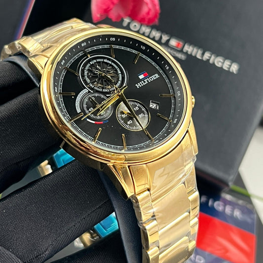 Montre Tommy Hilfiger (Ref MM038 Bracelet Acier inoxydable doré)
